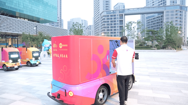 Unmanned delivery vehicles now on duty at Asian Games Village