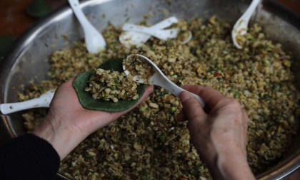 Green rice balls made to mark Qingming Festival