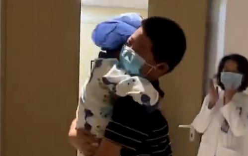 Boy excitedly hugs his hero elder brother after surgery
