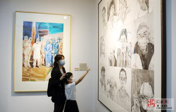 Visitors admire painting hangzhou.jpg