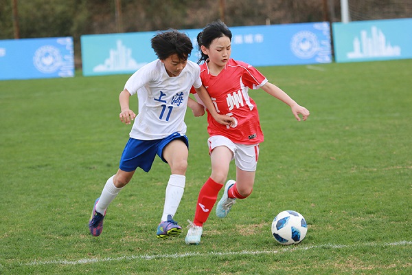Young girls participate in football competition in Hangzhou