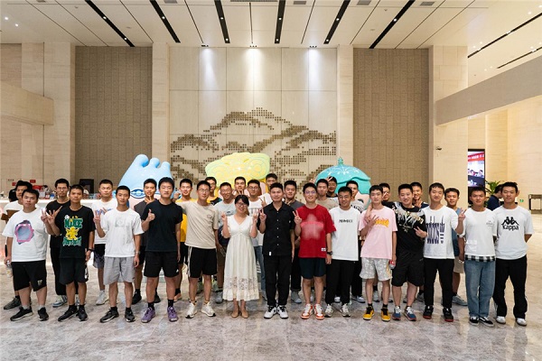 Volunteers stationed at Hangzhou Asian Games registration center