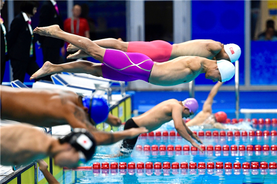 Hangzhou swimmer clinches double gold on home turf