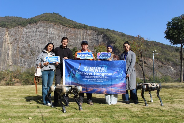 Expats explore future tech at Hangzhou robot training base