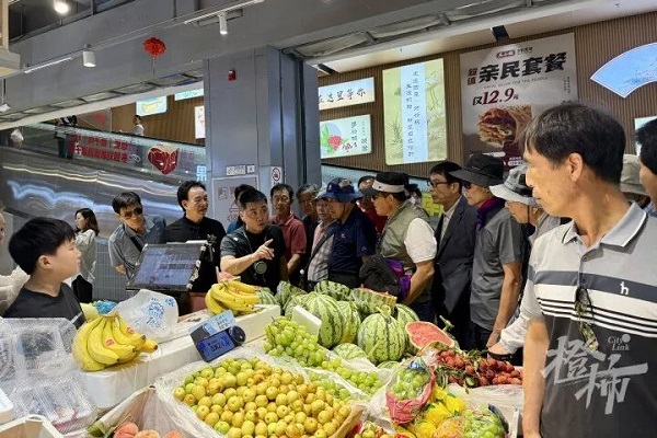 Hangzhou's Qiancun Wet Market becomes hit with intl tourists