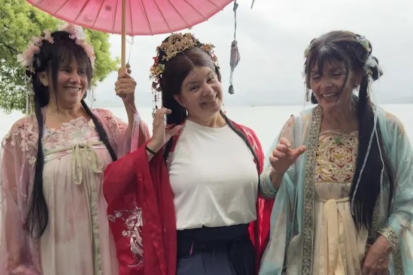 Argentina biz woman explores West Lake with exoskeleton device