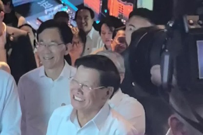 Lao top leader Thongloun interacts with Alibaba's digital human in Chinese in Hangzhou