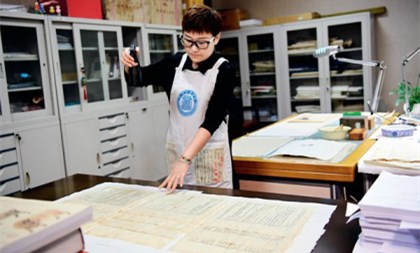 Restorer salvages ancient books, rescues history