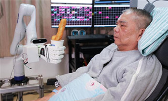 Implants give paralyzed man's brain new control