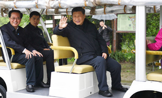 Xi's trip to Zhejiang boosts confidence