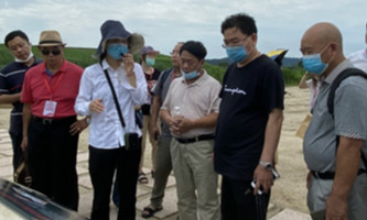 Delegates visit Liangzhu Archaeological Site for hands-on experience