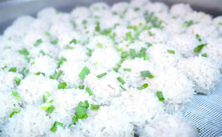Meatball wrapped in sticky rice