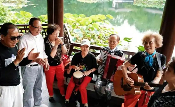 Silver-haired rock band members live life in full bloom