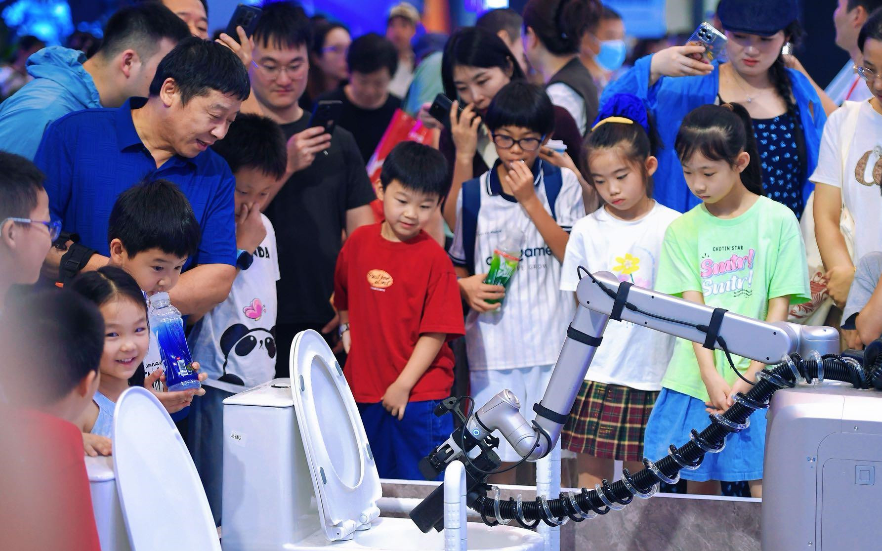 AI products move closer to real-life needs at Hangzhou expo as demand reshapes wearables, robots and specialized applications