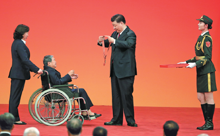 Xi hails heroic Party members